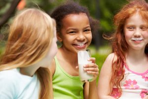 friends drinking milk together 