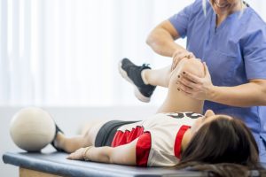 player at the doctors office to get a look at her injury.